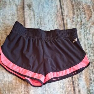 Athletic Black and Pink Shorts with Breathable Fabric. Size SMALL
